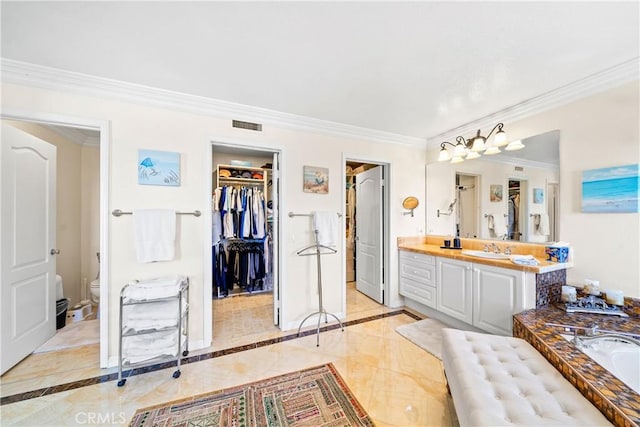 22541 Wakefield, Mission Viejo, CA 92692 - bathroom with ornamental molding, inlaid floor details, vanity, toilet, and baseboards