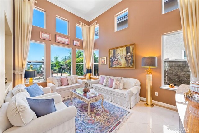 22541 Wakefield, Mission Viejo, CA 92692 - tiled living room with ornamental molding, a towering ceiling, healthy amount of natural light, and baseboards