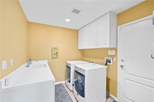 22541 Wakefield, Mission Viejo, CA 92692 - laundry room with cabinet space, washer and clothes dryer, baseboards, and recessed lighting