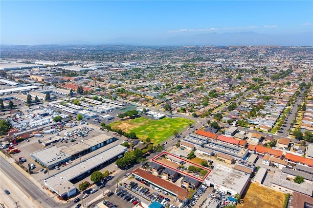 aerial view of property and surrounding area with property parcel outlined