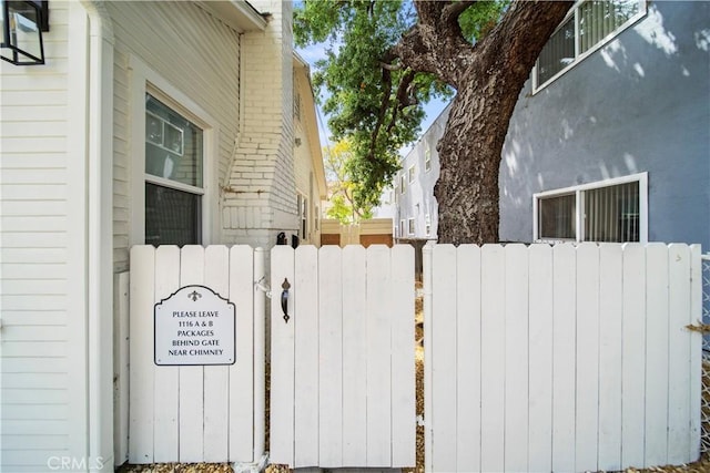 view of home's exterior with fence