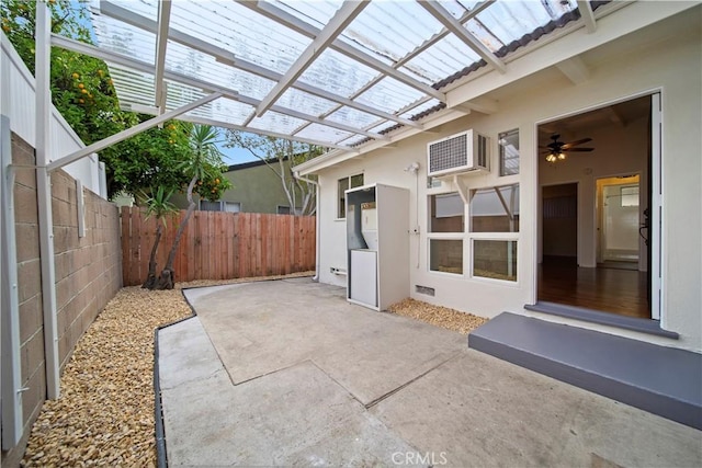 view of patio / terrace featuring a fenced backyard and a pergola