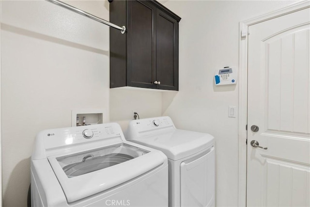 30156 Bristol Gate Ln, Menifee, CA 92584 - laundry room with cabinet space and independent washer and dryer
