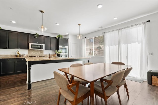 30156 Bristol Gate Ln, Menifee, CA 92584 - dining area featuring recessed lighting and dark wood-style flooring