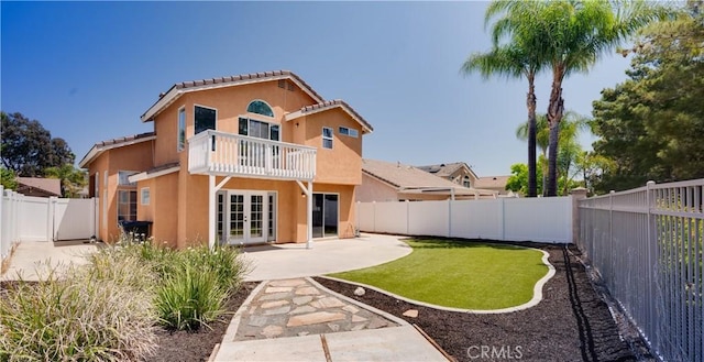 31695 Corte Avalos, Temecula, CA 92592 - back of house with french doors, a balcony, a tiled roof, and stucco siding