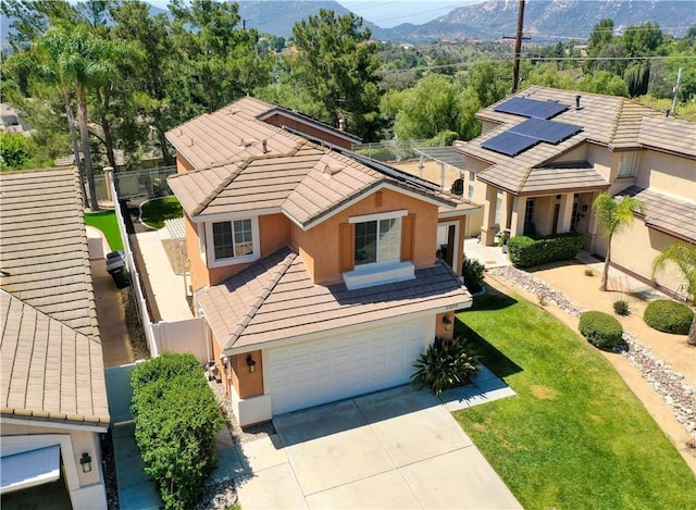 31695 Corte Avalos, Temecula, CA 92592 - view of front of home with stucco siding, a tile roof, an attached garage, concrete driveway, and a mountain view