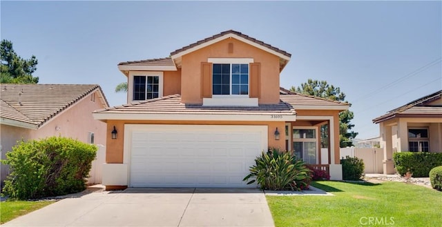 31695 Corte Avalos, Temecula, CA 92592 - traditional home with stucco siding, a tile roof, driveway, and an attached garage