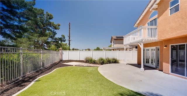 31695 Corte Avalos, Temecula, CA 92592 - fenced backyard featuring french doors, a patio area, and a balcony