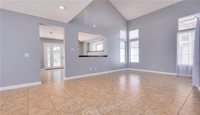 31695 Corte Avalos, Temecula, CA 92592 - unfurnished room with light tile patterned floors and high vaulted ceiling