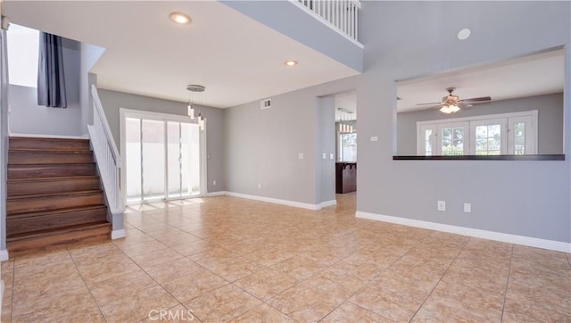 31695 Corte Avalos, Temecula, CA 92592 - unfurnished living room with light tile patterned floors, stairs, a ceiling fan, and recessed lighting