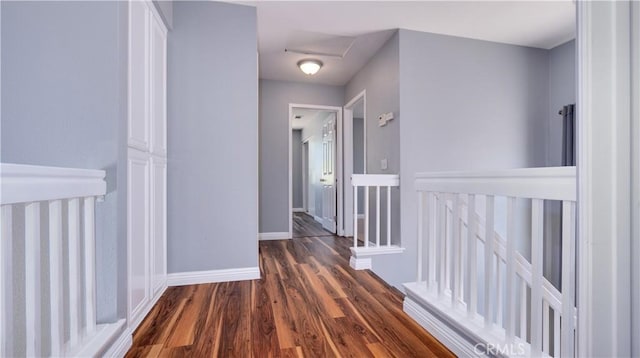 31695 Corte Avalos, Temecula, CA 92592 - corridor featuring wood finished floors, an upstairs landing, and attic access