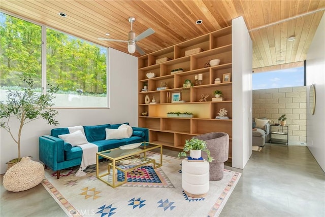 1357 Voorhees Ave, Manhattan Beach, CA 90266 - sitting room with wood ceiling, concrete flooring, ceiling fan, and built in features