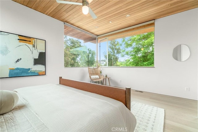 1357 Voorhees Ave, Manhattan Beach, CA 90266 - bedroom featuring wood ceiling, wood finished floors, a ceiling fan, and recessed lighting