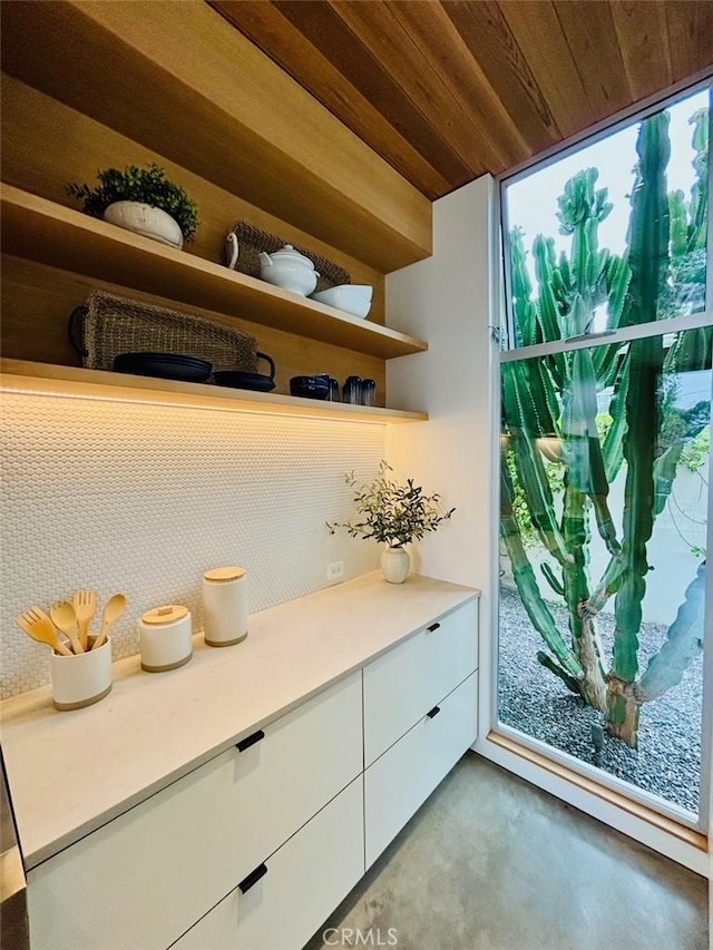 1357 Voorhees Ave, Manhattan Beach, CA 90266 - detailed view of wood ceiling, concrete floors, and decorative backsplash