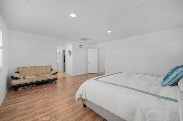 4736 Marrieta St, Jurupa Valley, CA 91752 - bedroom with wood finished floors and recessed lighting