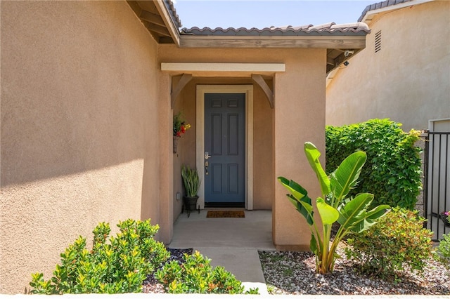 4736 Marrieta St, Jurupa Valley, CA 91752 - property entrance featuring stucco siding and a tile roof