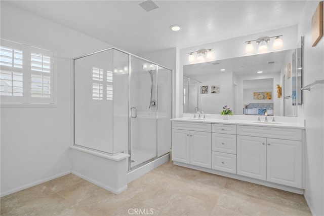 4736 Marrieta St, Jurupa Valley, CA 91752 - bathroom with double vanity, a stall shower, ensuite bath, and baseboards