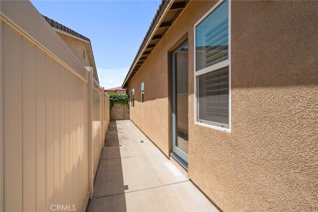 4736 Marrieta St, Jurupa Valley, CA 91752 - view of side of property with stucco siding and fence