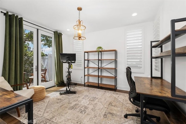 24 Vasto St, Rancho Mission Viejo, CA 92694 - office area featuring wood finished floors, baseboards, recessed lighting, french doors, and a chandelier