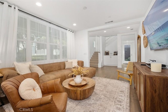 24 Vasto St, Rancho Mission Viejo, CA 92694 - living room with stairs, wood finished floors, and recessed lighting