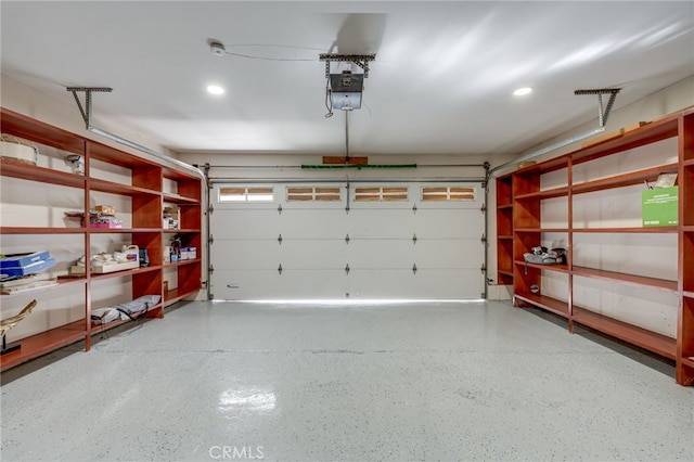 7655 Caminito Avola Ln, Jolla, CA 92037 - garage featuring recessed lighting and a garage door opener