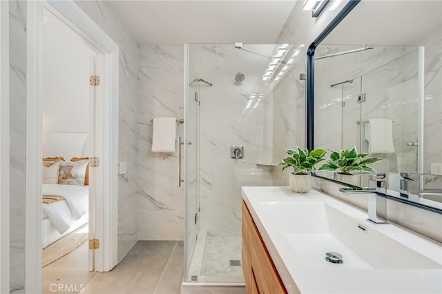7655 Caminito Avola Ln, Jolla, CA 92037 - full bath with a marble finish shower, vanity, and tile walls