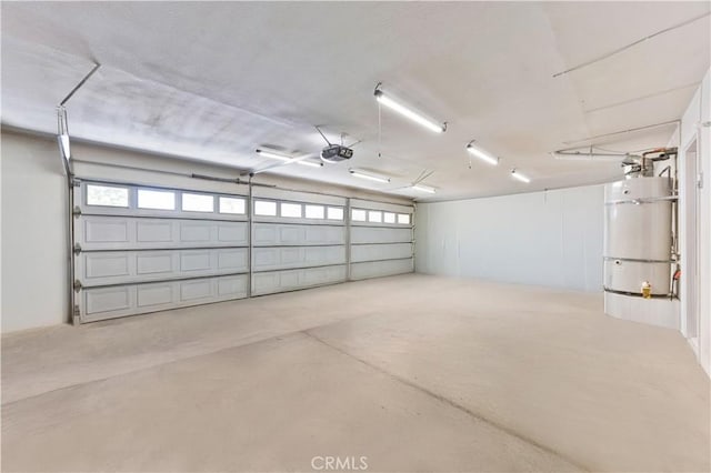 18680 Vantage Pointe Dr, Rowland Heights, CA 91748 - garage featuring secured water heater and a garage door opener
