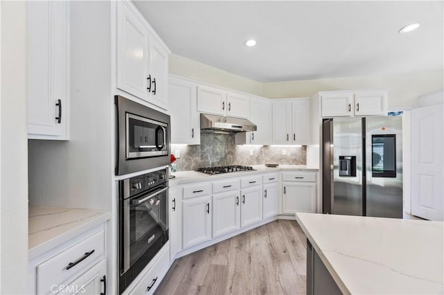 18680 Vantage Pointe Dr, Rowland Heights, CA 91748 - kitchen featuring stainless steel appliances, under cabinet range hood, white cabinets, and recessed lighting