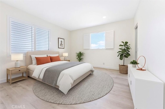 18680 Vantage Pointe Dr, Rowland Heights, CA 91748 - bedroom featuring light wood-type flooring and baseboards