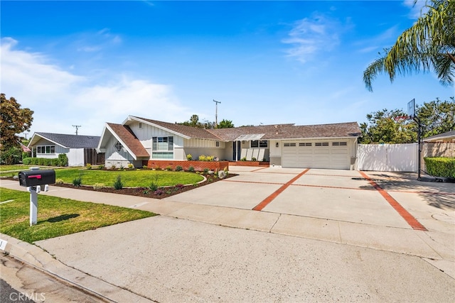 12921 Eveningside Dr, North Tustin, CA 92705 - view of front of house featuring a garage and driveway