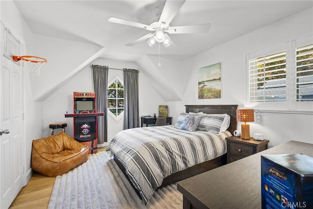 12921 Eveningside Dr, North Tustin, CA 92705 - bedroom with light wood-style flooring, a ceiling fan, and lofted ceiling