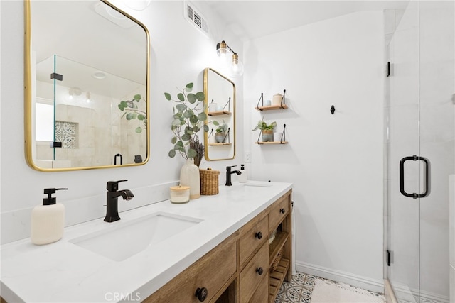 12921 Eveningside Dr, North Tustin, CA 92705 - bathroom featuring double vanity, a shower stall, and baseboards