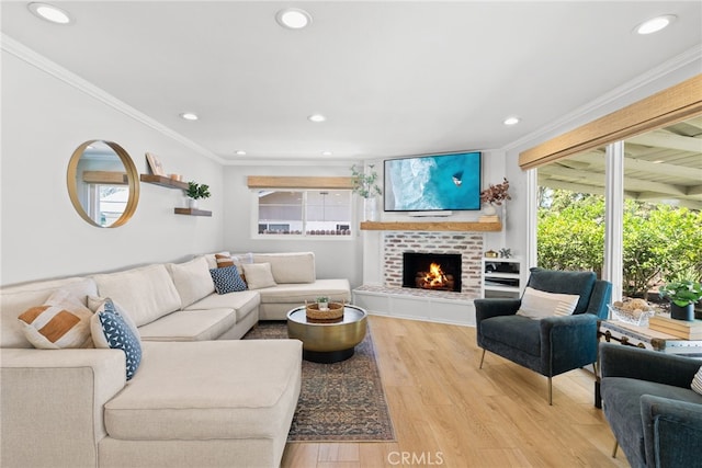 12921 Eveningside Dr, North Tustin, CA 92705 - living area featuring ornamental molding, light wood finished floors, recessed lighting, and a fireplace