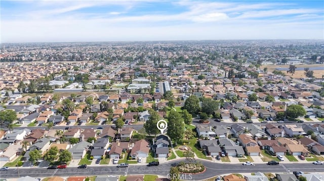15696 Paine St, Fontana, CA 92336 - aerial view of property and surrounding area featuring nearby suburban area