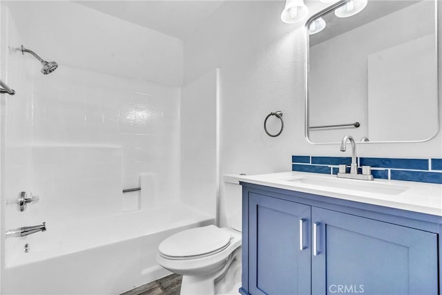 15696 Paine St, Fontana, CA 92336 - full bathroom with vanity, toilet, bathtub / shower combination, and wood finished floors