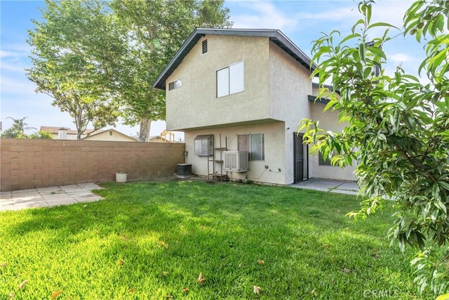 15696 Paine St, Fontana, CA 92336 - rear view of house featuring stucco siding and cooling unit