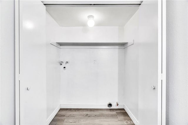 15696 Paine St, Fontana, CA 92336 - laundry area with wood finished floors and baseboards