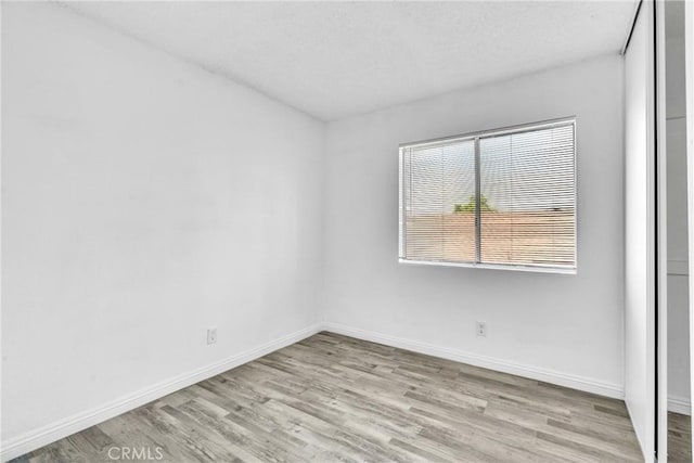 15696 Paine St, Fontana, CA 92336 - unfurnished room featuring wood finished floors and baseboards