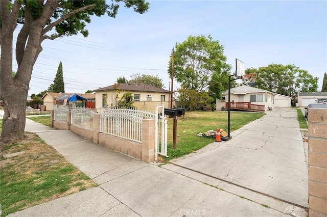 1009 E Peck St, Compton, CA 90221 - bungalow-style home with a gate and a detached garage