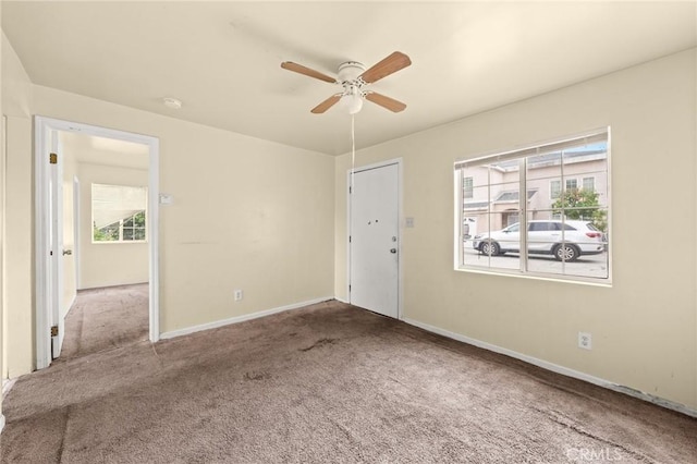 1009 E Peck St, Compton, CA 90221 - unfurnished room featuring carpet floors, a ceiling fan, a smoke detector, and baseboards