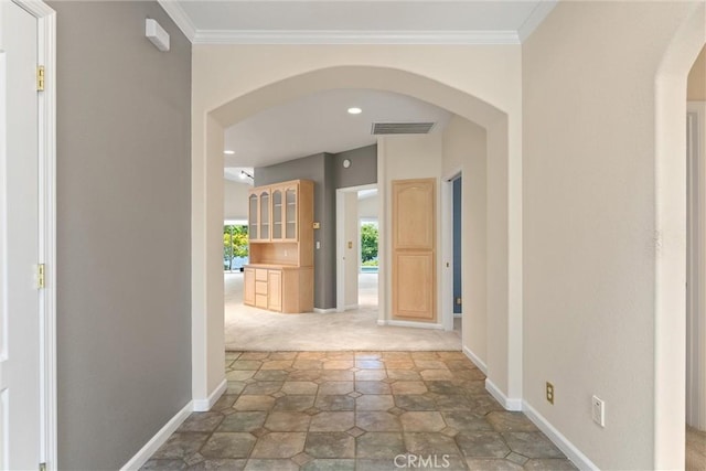 43 Edgewater Ct, Chico, CA 95928 - corridor with arched walkways, crown molding, light colored carpet, and recessed lighting