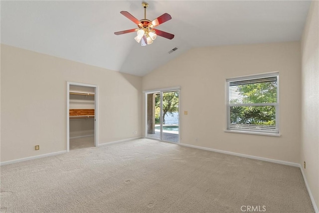 43 Edgewater Ct, Chico, CA 95928 - unfurnished bedroom with access to outside, lofted ceiling, carpet floors, a spacious closet, and a ceiling fan