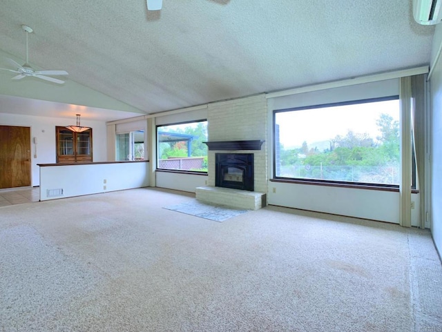 3130 E Victoria Dr, Alpine, CA 91901 - unfurnished living room with a ceiling fan, plenty of natural light, carpet flooring, lofted ceiling, and a textured ceiling