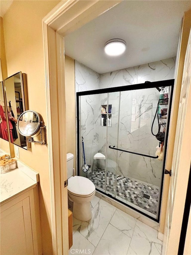4909 New Castle Ln Unit A, Covina, CA 91724 - full bath featuring marble look tiles, toilet, a marble finish shower, and vanity