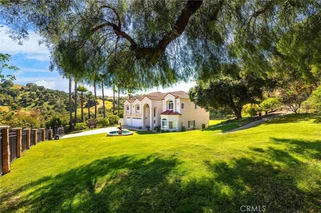1036 Alpine Ct, Chino Hills, CA 91709 - view of yard featuring a garage and concrete driveway