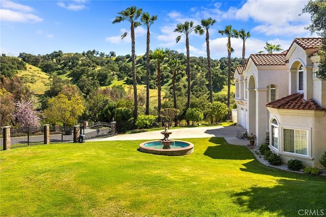 1036 Alpine Ct, Chino Hills, CA 91709 - view of yard with an attached garage