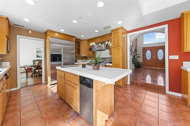 1036 Alpine Ct, Chino Hills, CA 91709 - kitchen with appliances with stainless steel finishes, recessed lighting, light tile patterned flooring, a center island, and tile countertops
