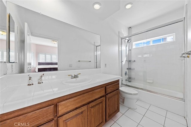 1036 Alpine Ct, Chino Hills, CA 91709 - ensuite bathroom with tile patterned floors, toilet, vanity, and enclosed tub / shower combo