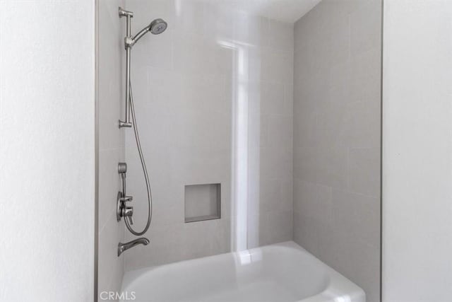 bathroom featuring bathing tub / shower combination