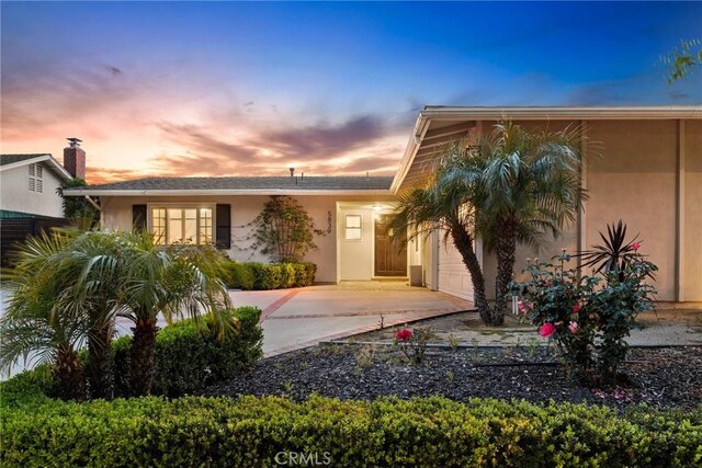 5839 Parkmor Rd, Calabasas, CA 91302 - view of front facade featuring stucco siding and driveway